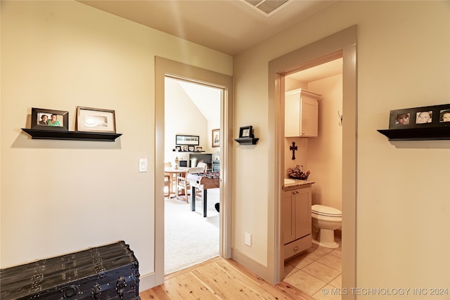 corridor featuring light hardwood / wood-style flooring