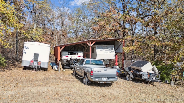 view of car parking with a carport