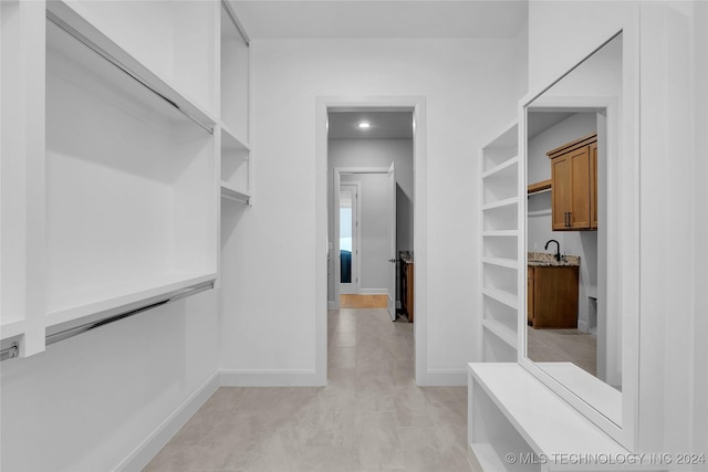 spacious closet with sink