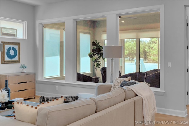 living room with light hardwood / wood-style flooring