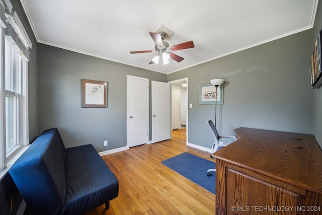 office space featuring ornamental molding, hardwood / wood-style flooring, and ceiling fan