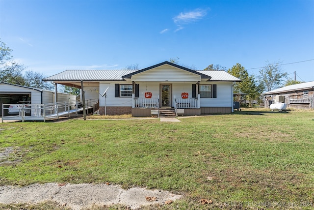 view of front of home with a porch and a front yard