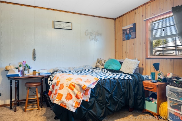 bedroom featuring light colored carpet, crown molding, and wood walls