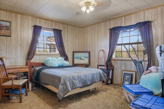 161 N Hickory, Tushka, OK 74525 - carpeted bedroom with wood walls