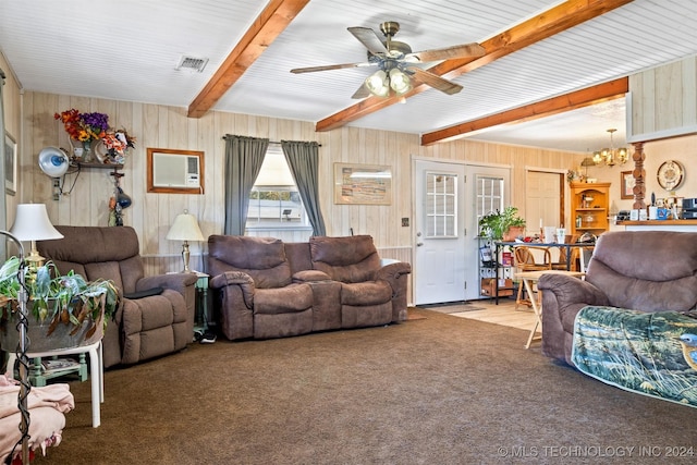 161 N Hickory, Tushka, OK 74525 - living room with carpet flooring, beam ceiling, ceiling fan with notable chandelier, and wooden walls