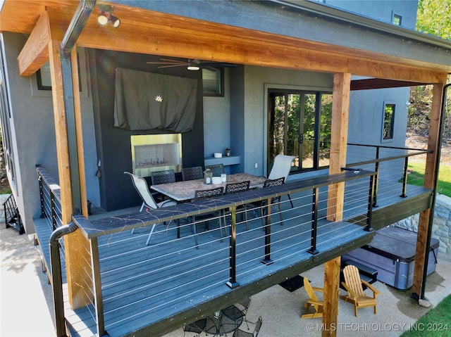 wooden terrace with ceiling fan