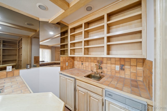 kitchen with decorative backsplash, sink, light brown cabinets, and tile counters