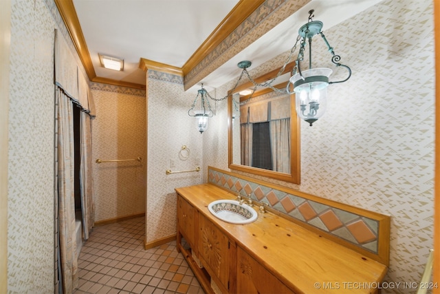 bathroom featuring vanity, crown molding, walk in shower, and tile patterned flooring