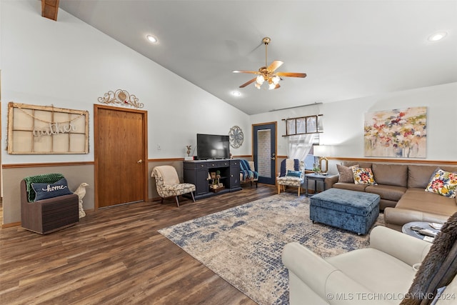 living room with dark wood-type flooring, ceiling fan, and high vaulted ceiling