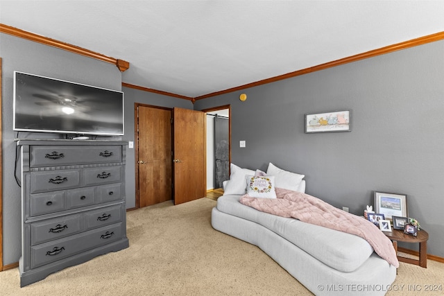 bedroom featuring light carpet and crown molding