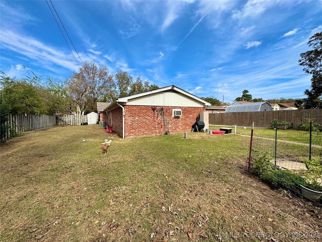 exterior space with a lawn