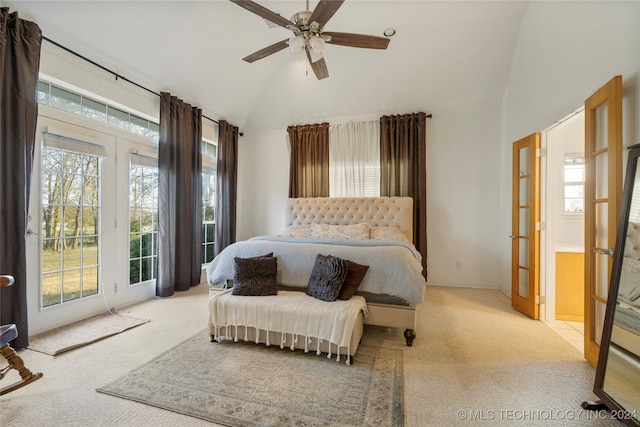 bedroom featuring ceiling fan, light carpet, lofted ceiling, and access to outside