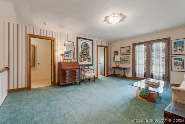 2840 S Victor Ave, Tulsa, OK 74114 - sitting room with french doors, carpet flooring, crown molding, and wallpapered walls