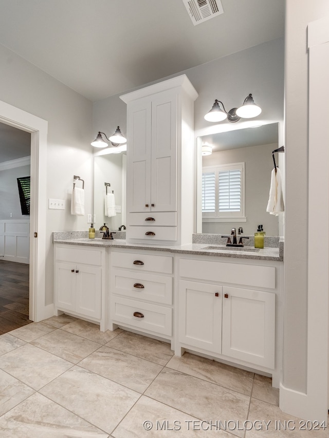 bathroom featuring vanity and hardwood / wood-style flooring