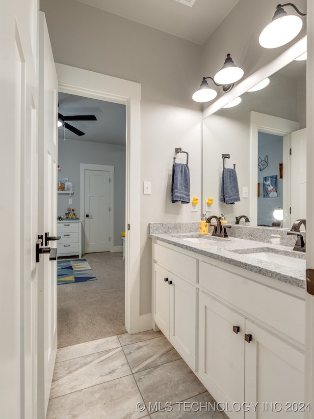 bathroom with vanity and ceiling fan