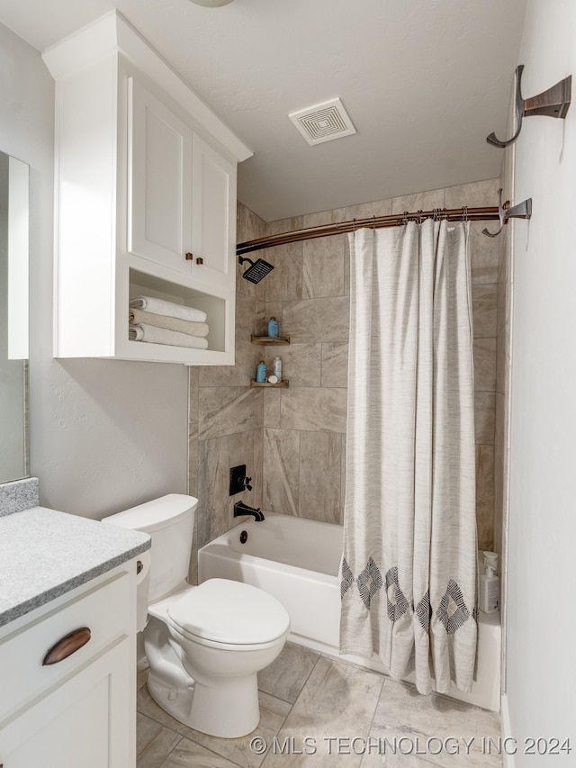 full bathroom featuring vanity, toilet, and shower / bathtub combination with curtain