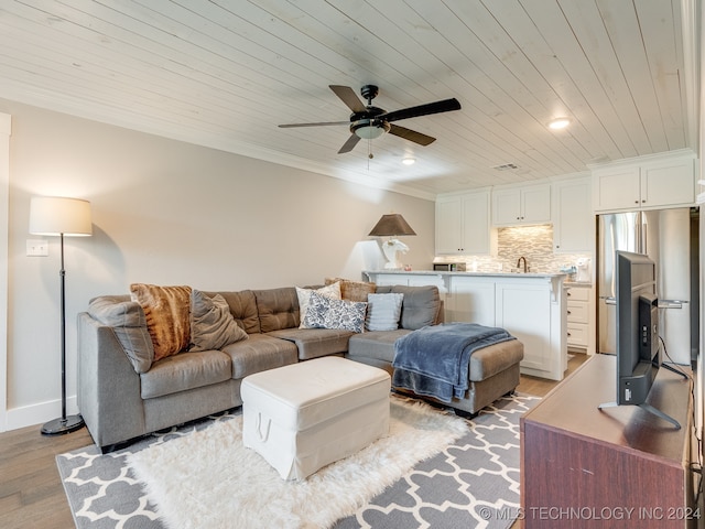 living room with wooden ceiling, light wood-type flooring, and ceiling fan