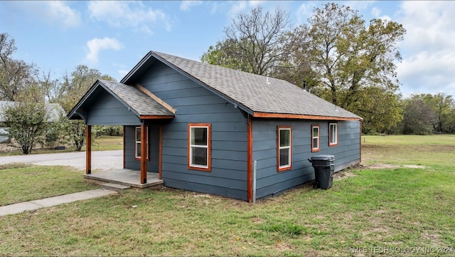 view of home's exterior featuring a lawn