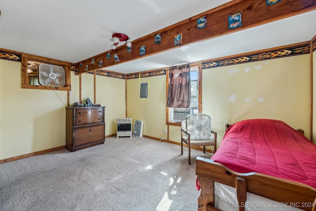 carpeted bedroom featuring heating unit