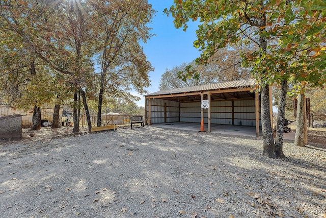 garage featuring a carport