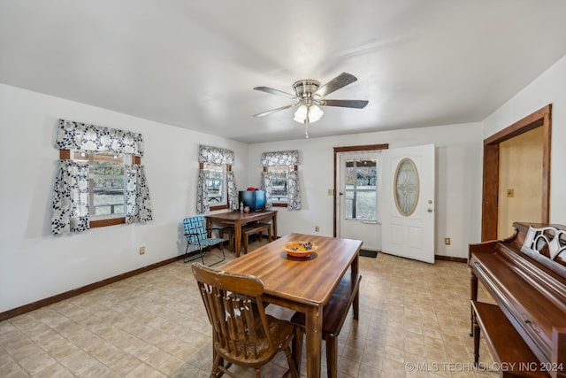 dining space featuring ceiling fan