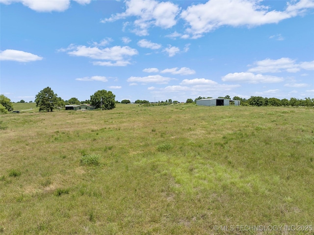 7740 Swayback, Sulphur, OK 73086 - view of yard featuring a view of rural / pastoral area and an outdoor structure