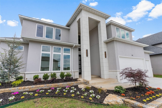 view of front of property with a garage