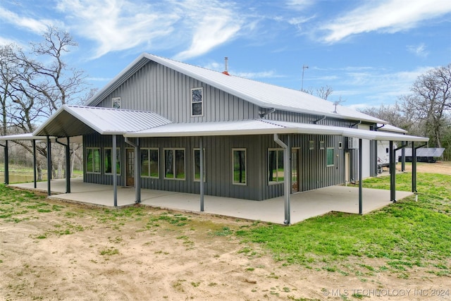 rear view of property with a patio