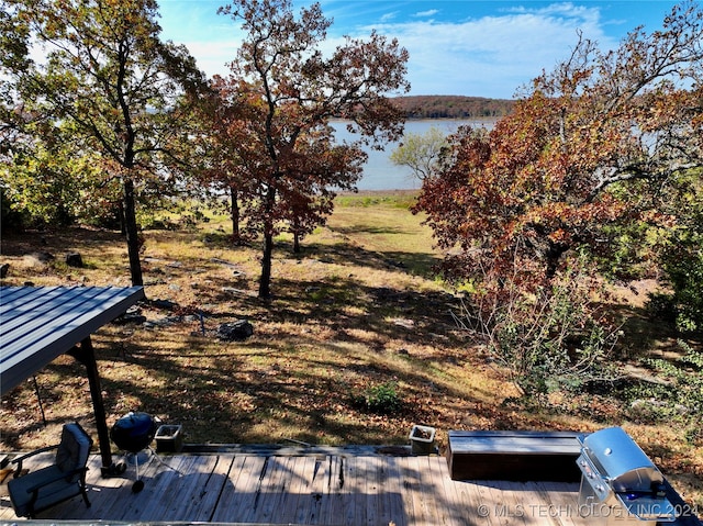 exterior space with a water view