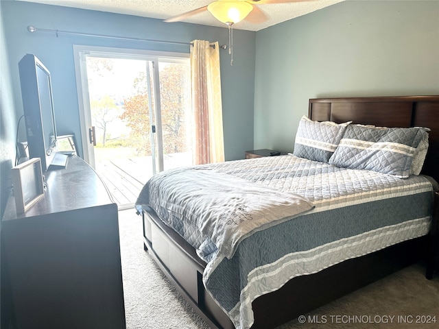 bedroom with carpet, a textured ceiling, access to outside, and ceiling fan