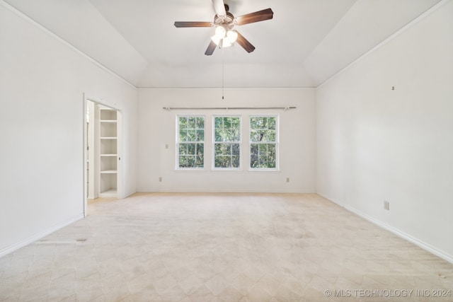 spare room featuring ceiling fan and light colored carpet