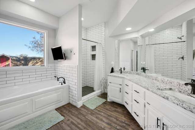 kitchen featuring white cabinetry and dark hardwood / wood-style floors