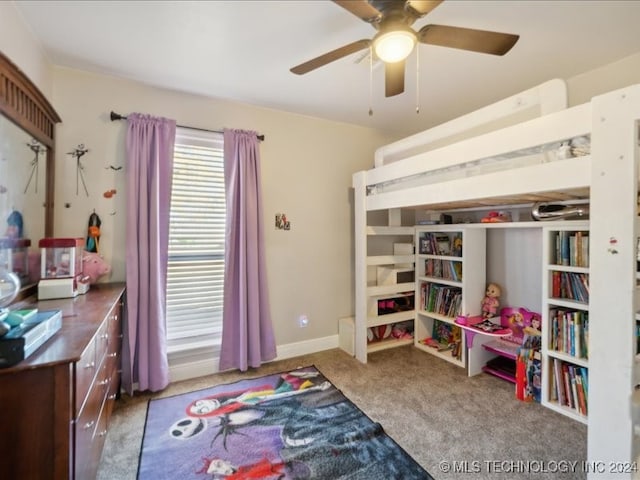 bedroom featuring ceiling fan and carpet floors