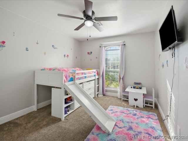 bedroom with ceiling fan and carpet flooring