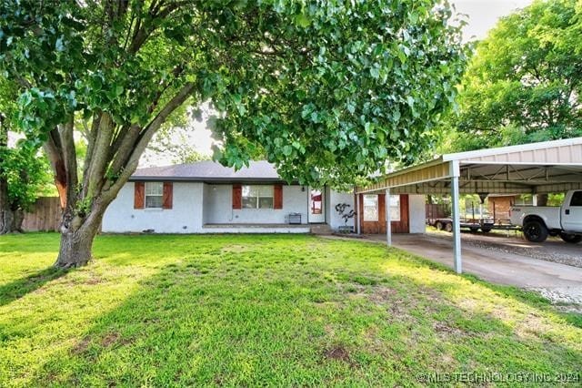 view of front of home with a front yard