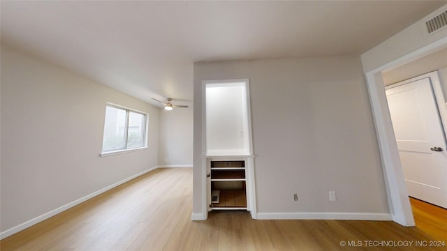 unfurnished bedroom with light wood-type flooring