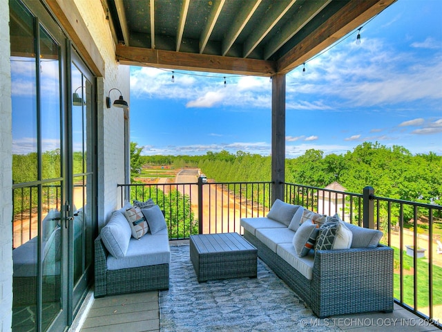 balcony with an outdoor hangout area