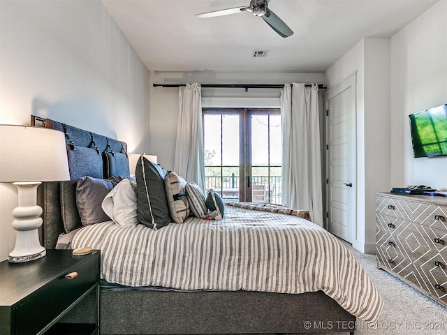 bedroom featuring french doors, access to exterior, carpet, and ceiling fan