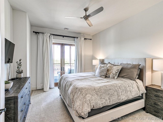 bedroom with french doors, ceiling fan, light carpet, and access to exterior