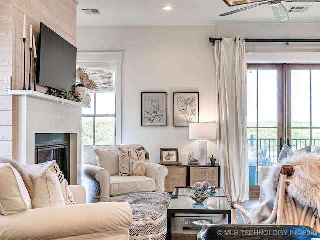 living room featuring a wealth of natural light and french doors