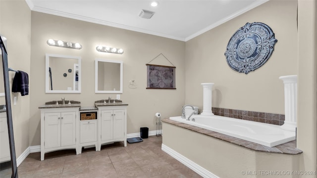 bathroom featuring vanity, crown molding, tile patterned floors, and tiled tub