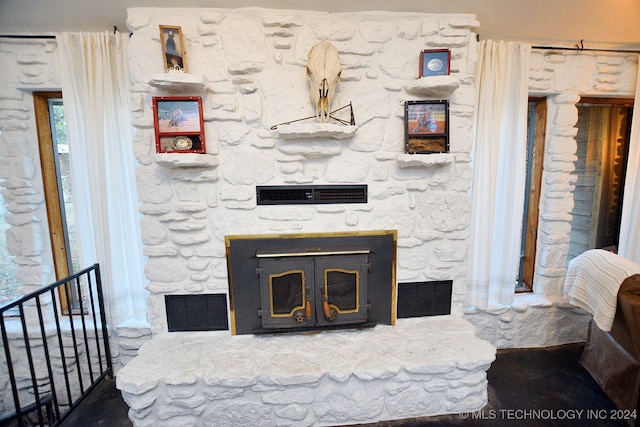 interior details with a fireplace