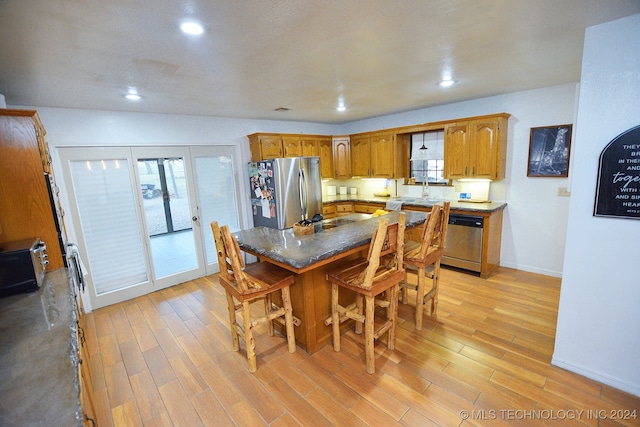 dining room with light wood-type flooring