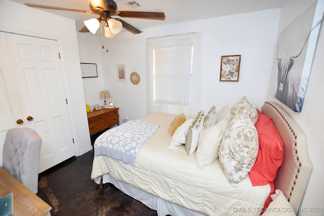 bedroom featuring a closet and ceiling fan