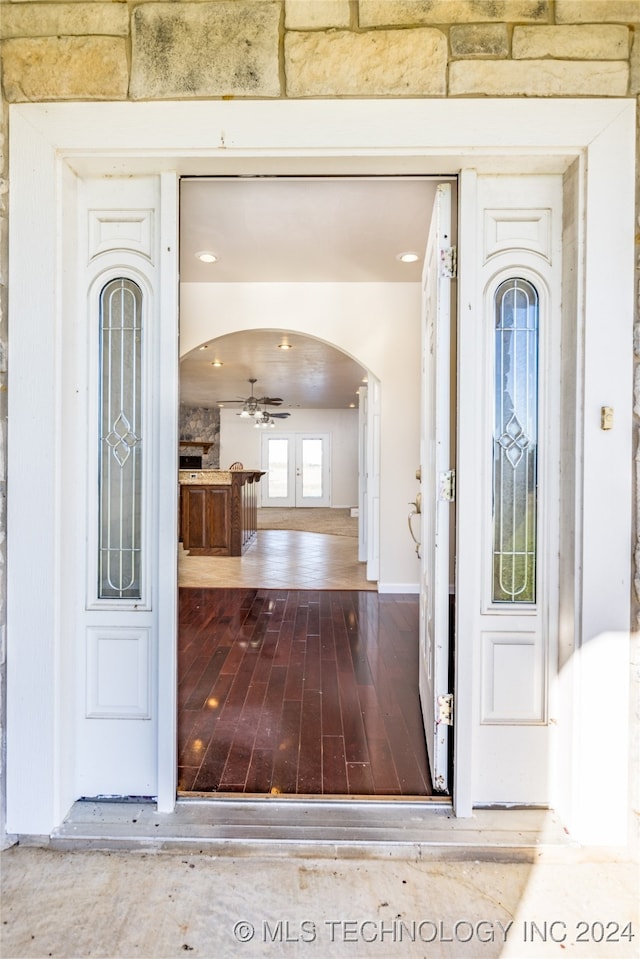 view of exterior entry featuring french doors