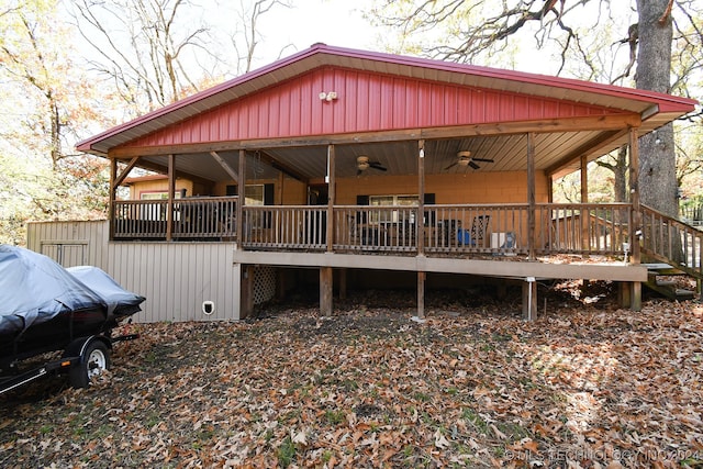 exterior space featuring ceiling fan and a wooden deck