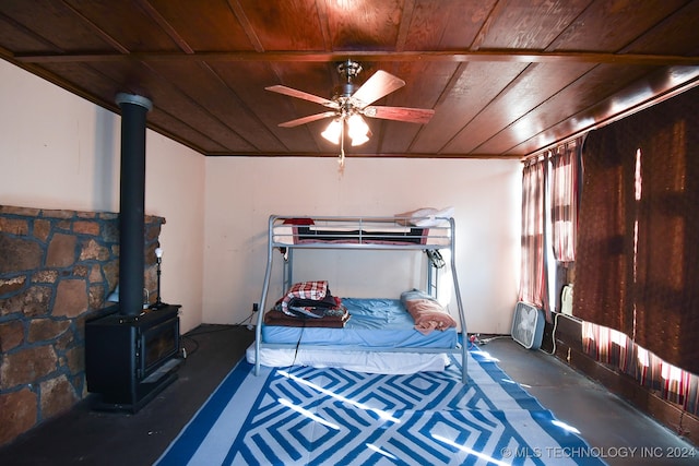 bedroom with wooden ceiling and ceiling fan