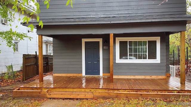 entrance to property with a deck