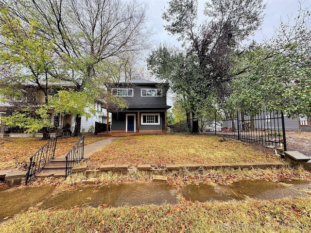 view of front facade with a front lawn