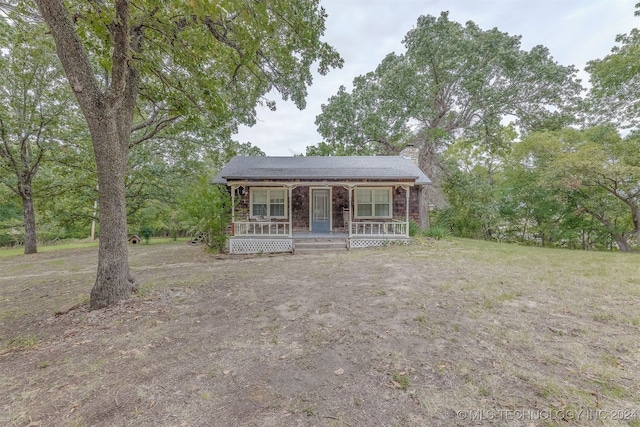 view of front of home featuring covered porch